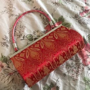 An antique clutch purse